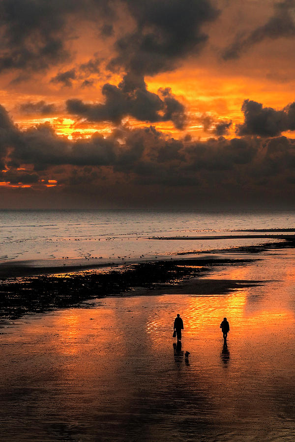Sunset walkers on Worthing Beach Photograph by Len Brook