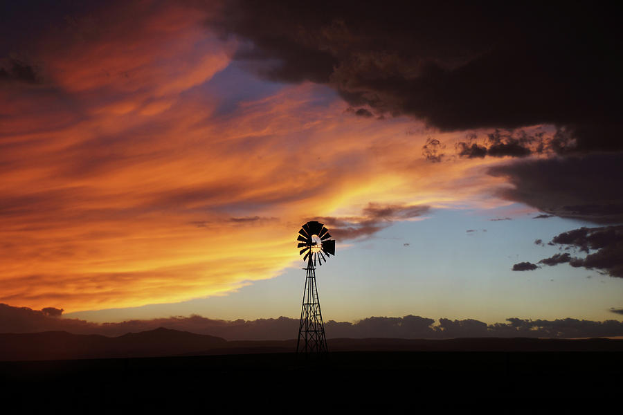 Sunset Windmill drama Photograph by Julie Carter