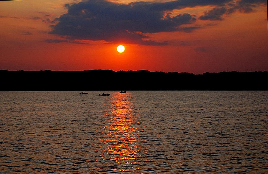 Sunset with fishing boats Photograph by Larry Nielson - Fine Art America