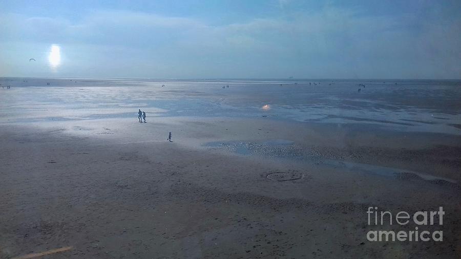 Sunshine Reflections on Southport Beach Photograph by Joan-Violet Stretch