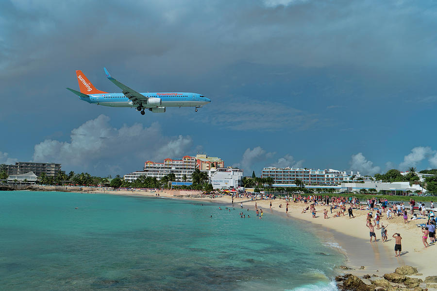 Sunset Photograph - Sunwing Airline at SXM airport by David Gleeson