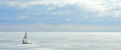 Winter Activity Photograph - Superior Sailing by Bill Morgenstern Winter Activity Photograph - Superior Sailing by Bill Morgenstern