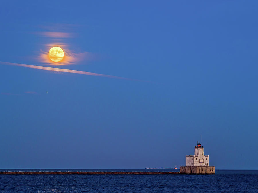 Lake Michigan Photograph - Supermoon over the white lighthouse by Kristine Hinrichs