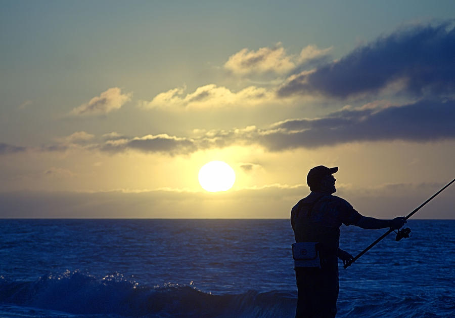 Surfcasting Photograph by Newwwman