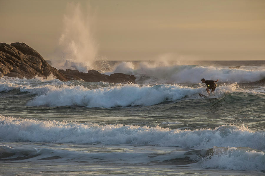 Surfer off the Dana Point Headlands Photograph by Cliff Wassmann