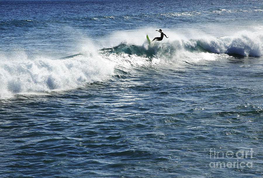 Surfer riding a wave Photograph by Brandon Tabiolo - Printscapes