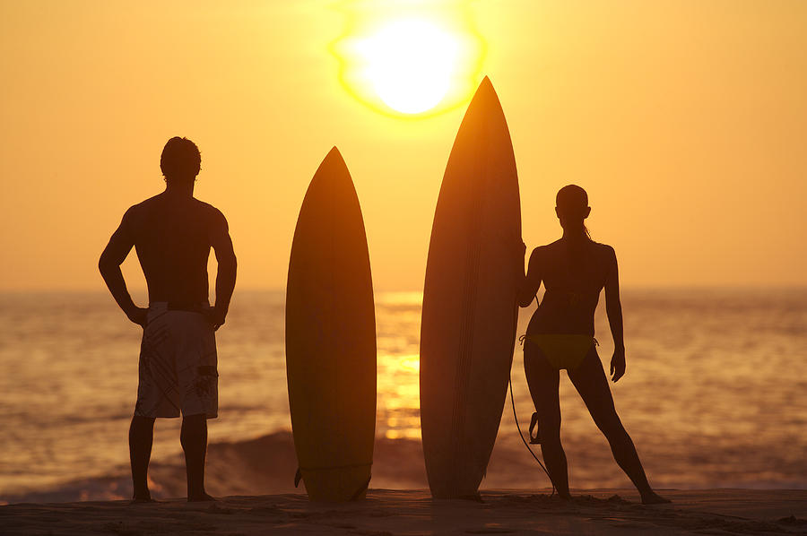 Surfer Silhouettes Photograph by Larry Dale Gordon - Printscapes