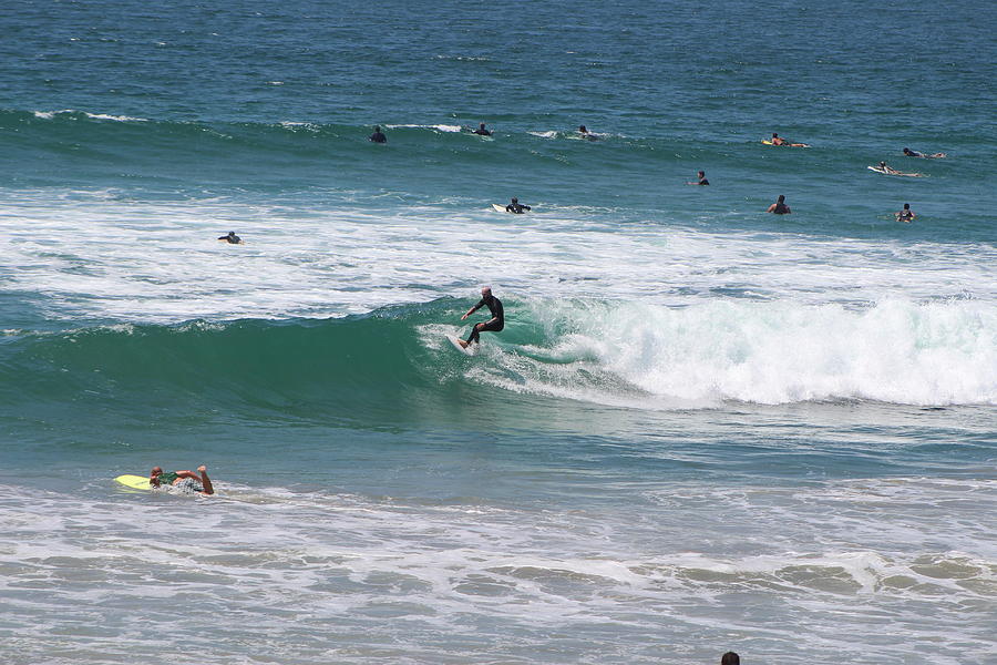 Surfer Surfing in Pacific Ocean Photograph by Colleen Cornelius