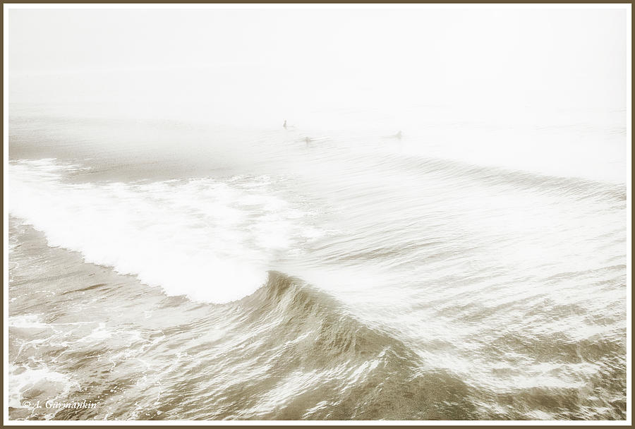 Surfers in Ocean Mist Photograph by A Macarthur Gurmankin