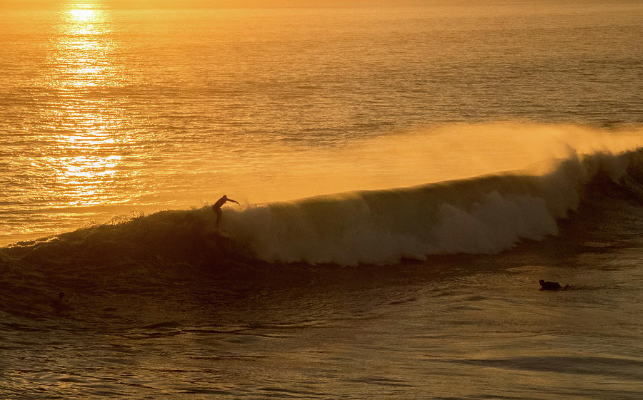 Surfing off Huntington Beach Photograph by Robert Small | Fine Art America