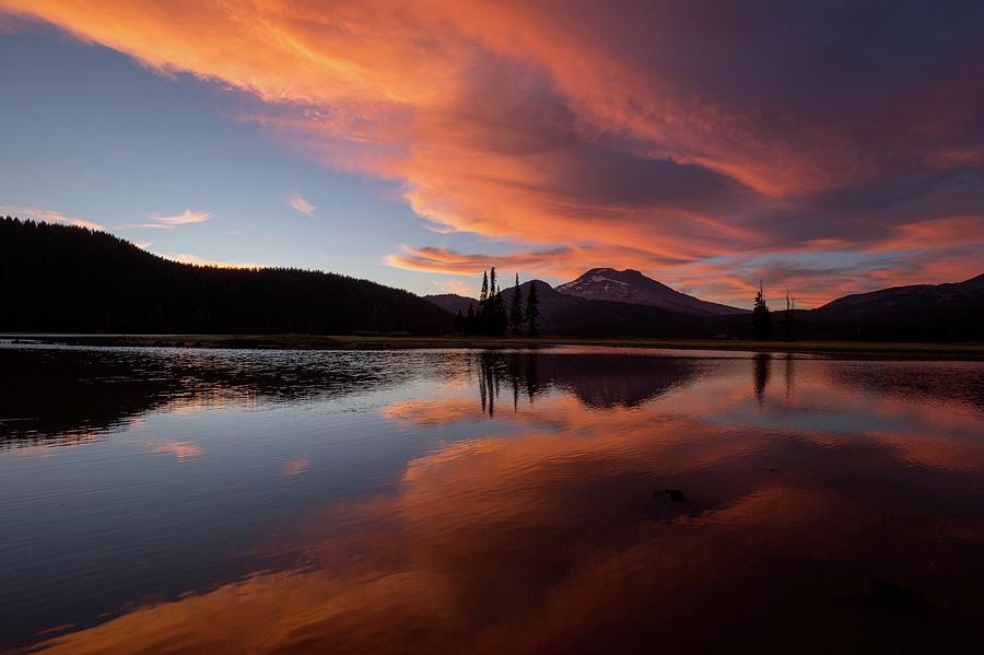 Sweeping clouds over South Sister mountain Photograph by Lynn Hopwood