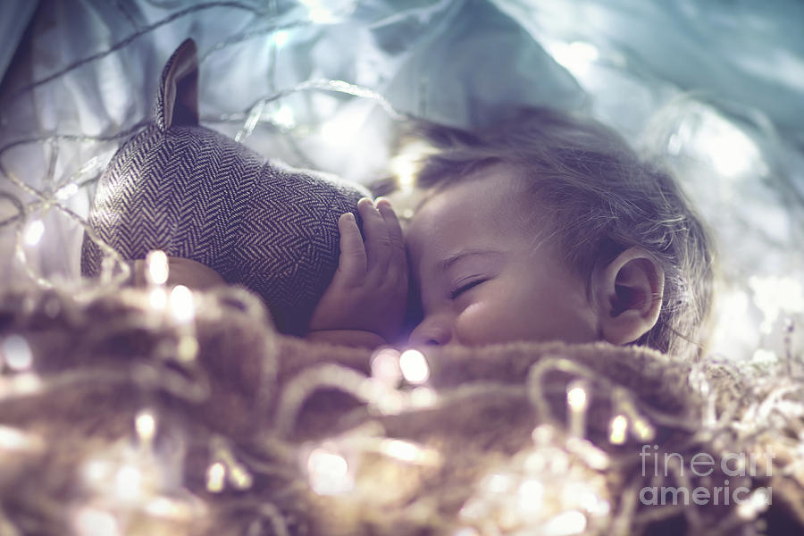 Sweet baby sleeping with soft toy  Photograph by Anna Om