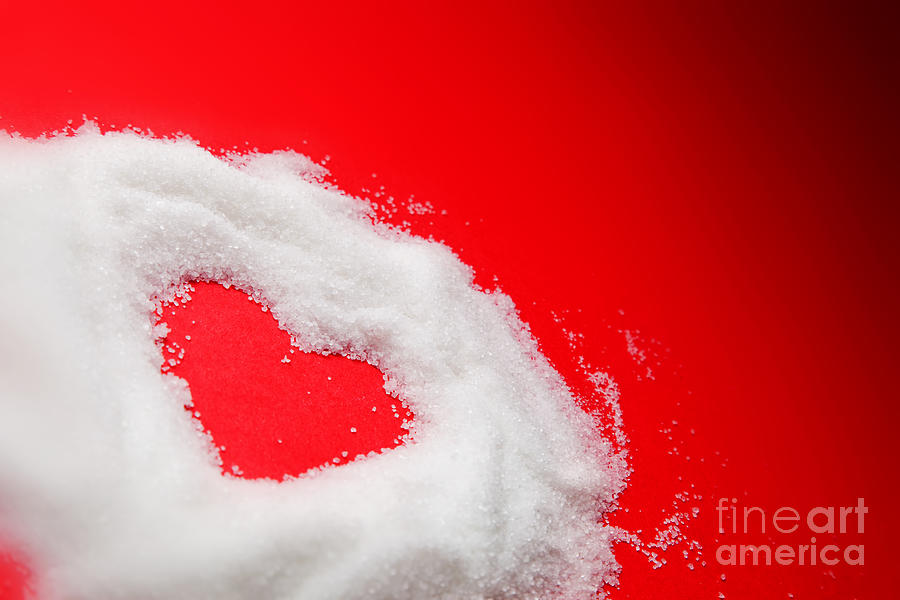 Sweet Heart Of Sugar On Red Background Photograph