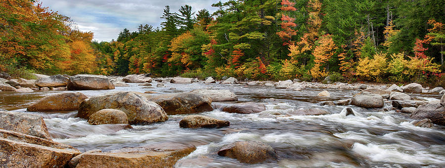 Swift River runs through fall colors Photograph by Jeff Folger