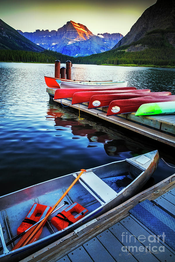 Swiftcurrent Lake and Canoes Photograph by Craig J Satterlee