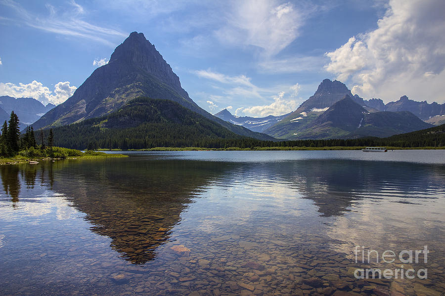 Swiftcurrent Lake and Mount Grinnell Photograph by Spencer Baugh