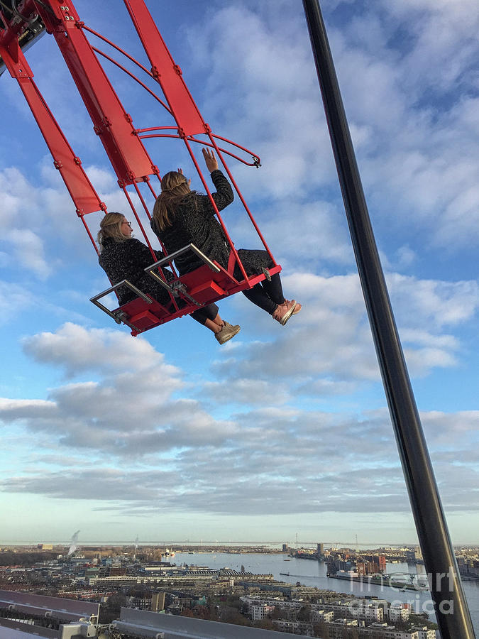 Swing high above with a view of Amsterdam Photograph by Patricia Hofmeester