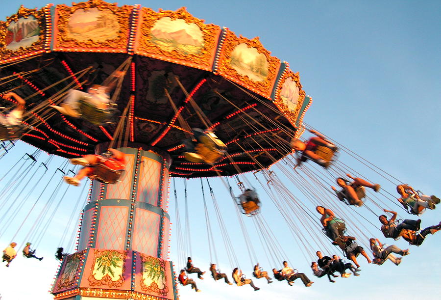 Swinging at the Fair Photograph by Caroline Reyes-Loughrey - Fine Art ...