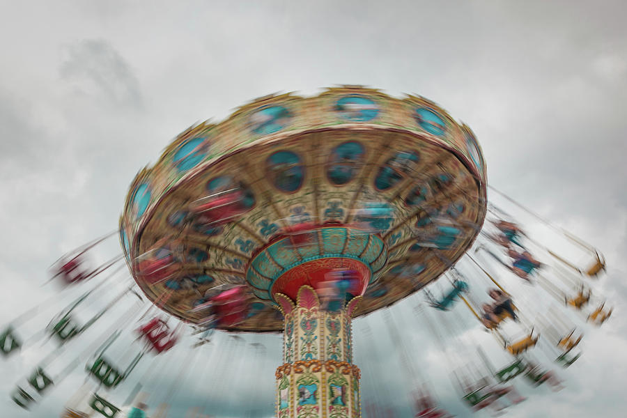 Swings in Motion with Stormy Sky Photograph by Erin Cadigan - Pixels