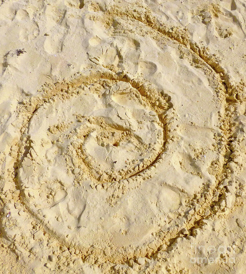 Swirl drawn in the sand Photograph by Francesca Mackenney