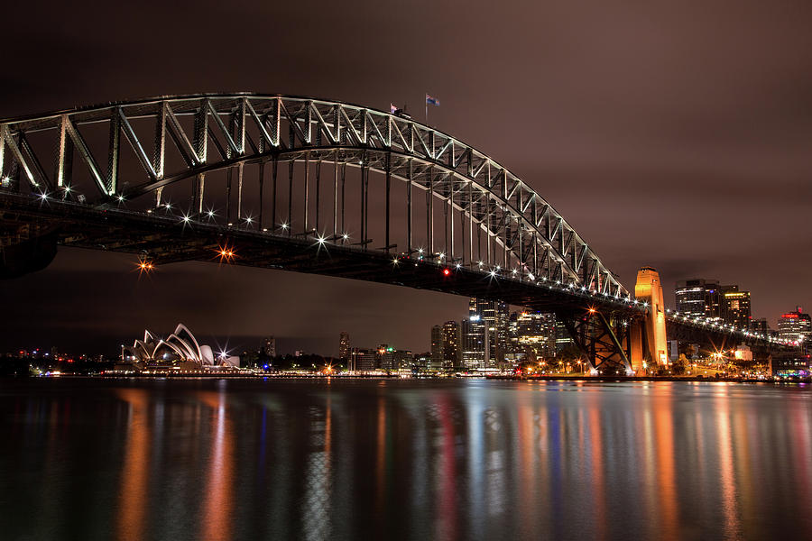 Sydney Harbor at Night Photograph by John Daly