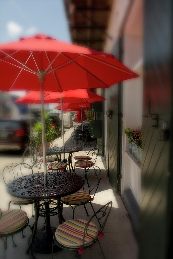 Umbrella Photograph - Table At New Orleans French Market by Greg and Chrystal Mimbs