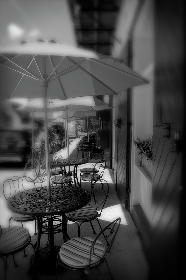 Umbrella Photograph - Table At New Orleans French Market In Black And White by Greg and Chrystal Mimbs