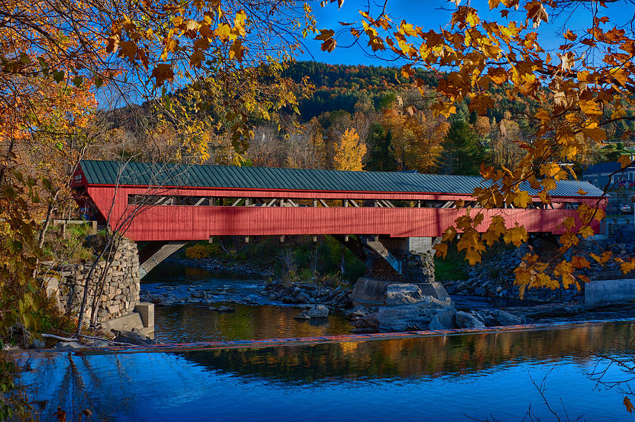 Taftsville covered bridge in autumn colors Photograph by Jeff Folger