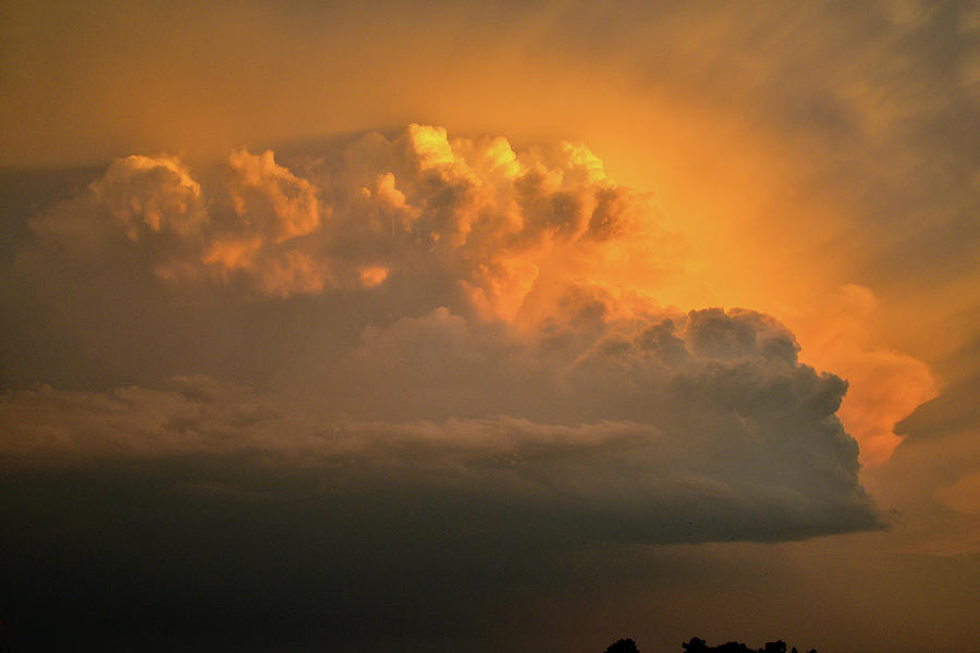 Tail End of Storm Front in Colorado at Sunset Photograph by Ray Mathis