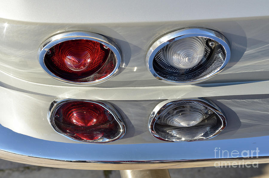 Tail lights of a 1966 Chevrolet Corvette Sting Ray 427 Turbo-Jet Photograph by George Atsametakis