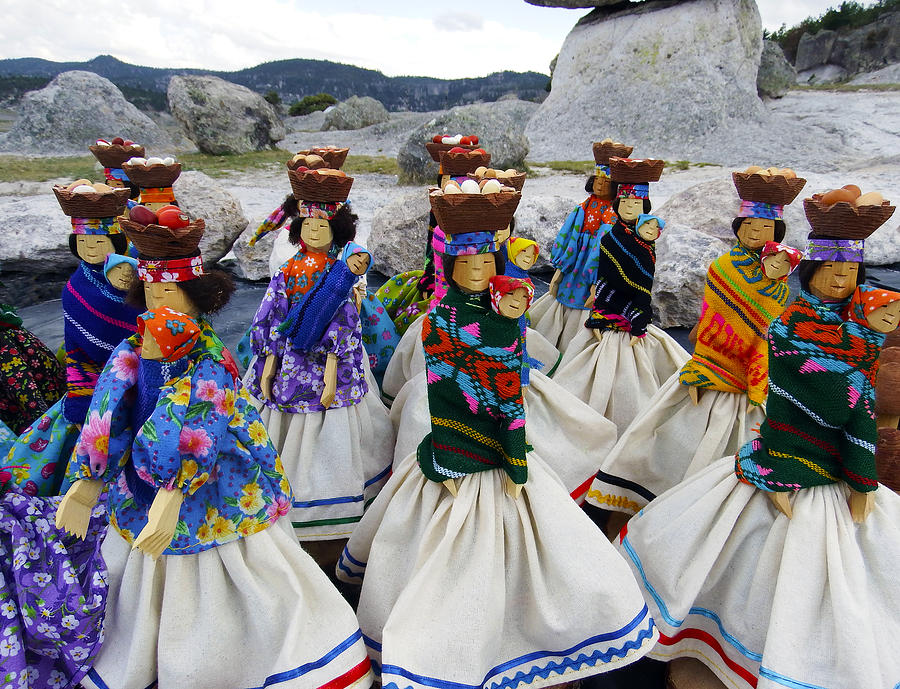 Tarahumara dolls dancing amongst the rocks Photograph by Kurt Van Wagner