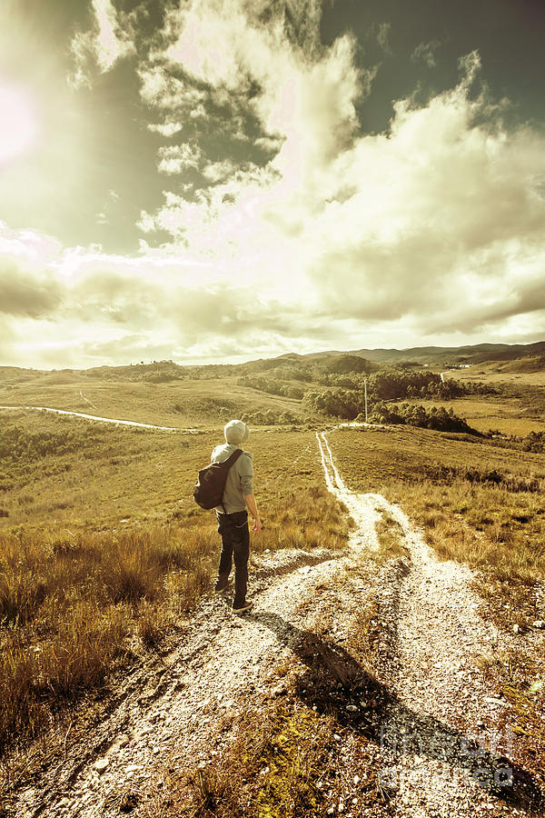 Tasmanian man on road in nature reserve Photograph by Jorgo Photography