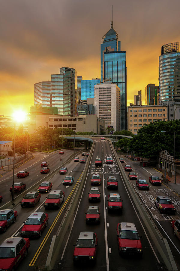 Taxi and Hongkong city with morning sunrise Photograph by Anek Suwannaphoom