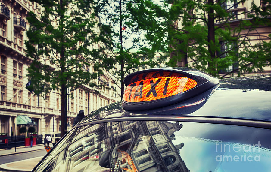 taxi cab by London street Photograph by Ariadna De Raadt
