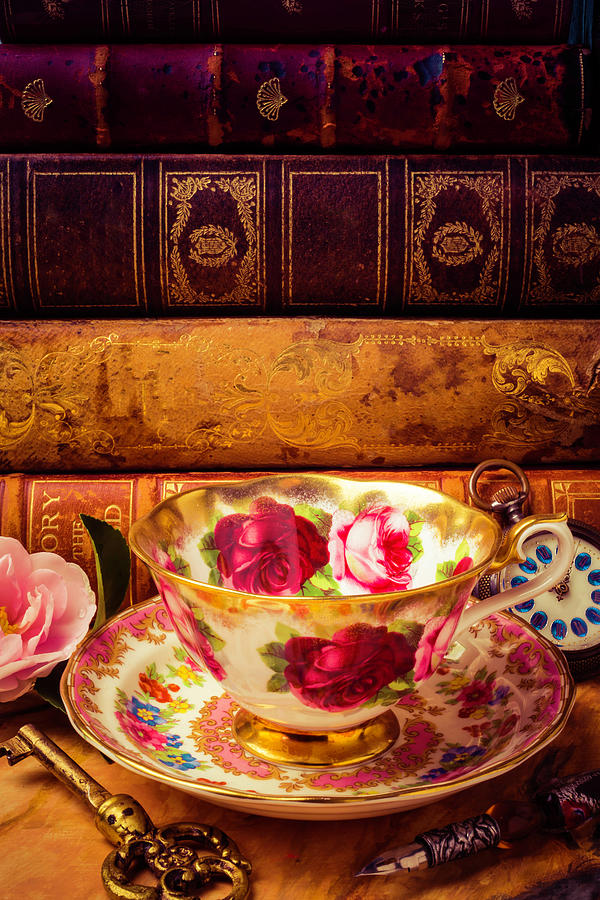 Tea Cup And Old Books Photograph by Garry Gay