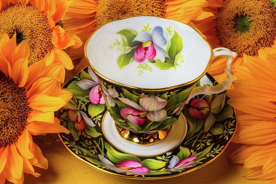 Tea Cup And Sunflowers Photograph by Garry Gay