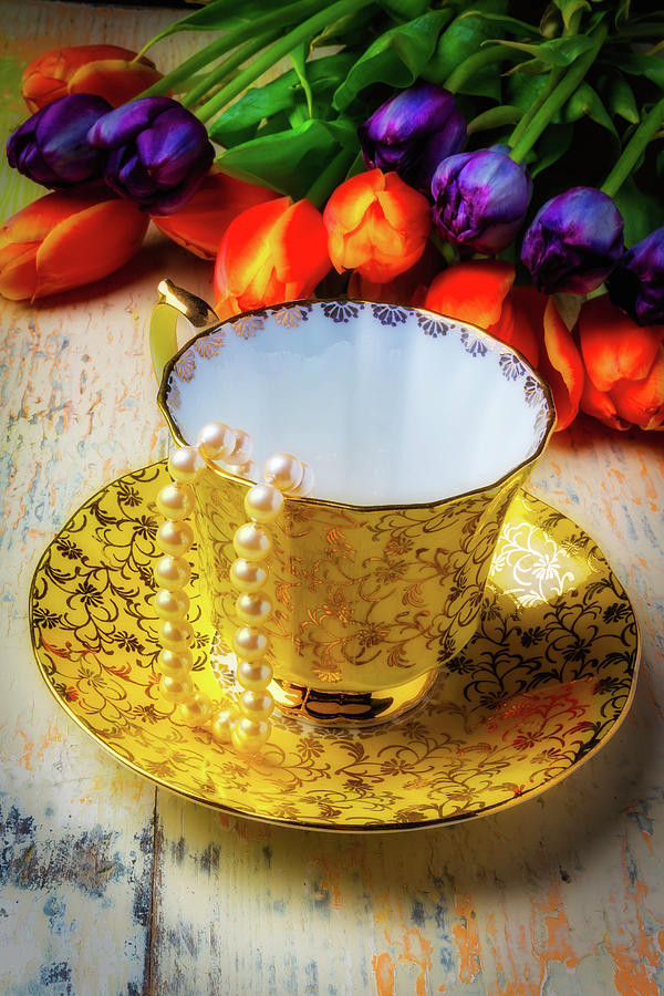 Tea Cup And Tulips Photograph by Garry Gay