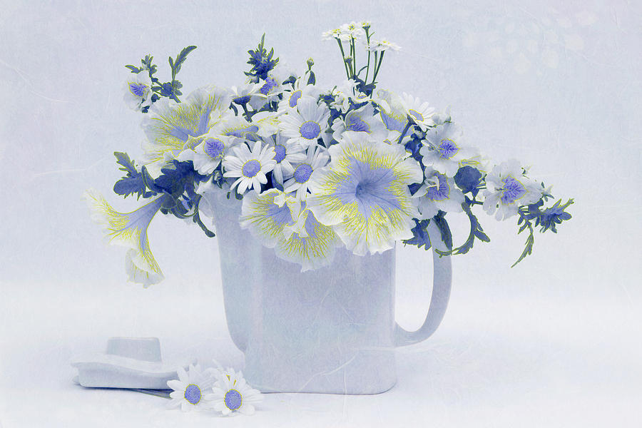 Teapot Of Yellow And Blue Petunias And Daisies  Photograph by Sandra Foster