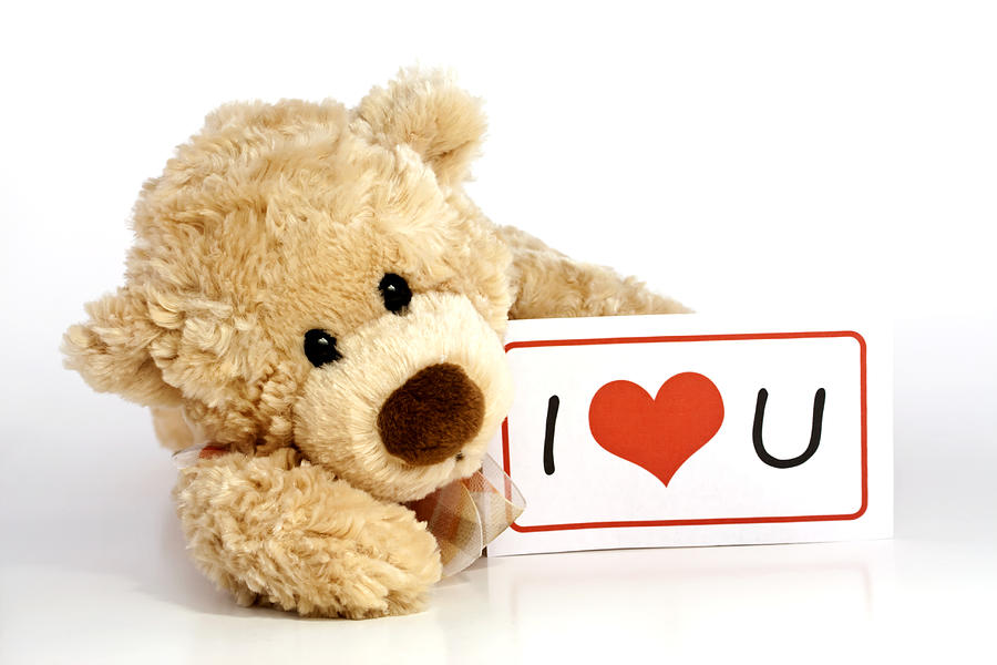 Bear Photograph - Teddy bear with I Love You Sign by Blink Images