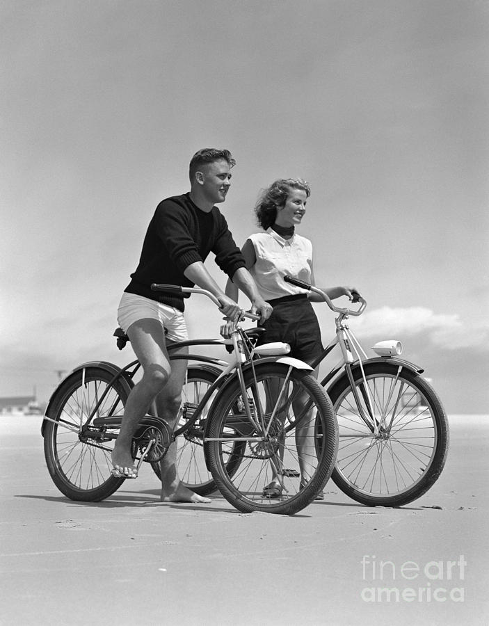 Teen Boy And Girl Biking At The Beach Photograph by H. Armstrong Roberts/ClassicStock