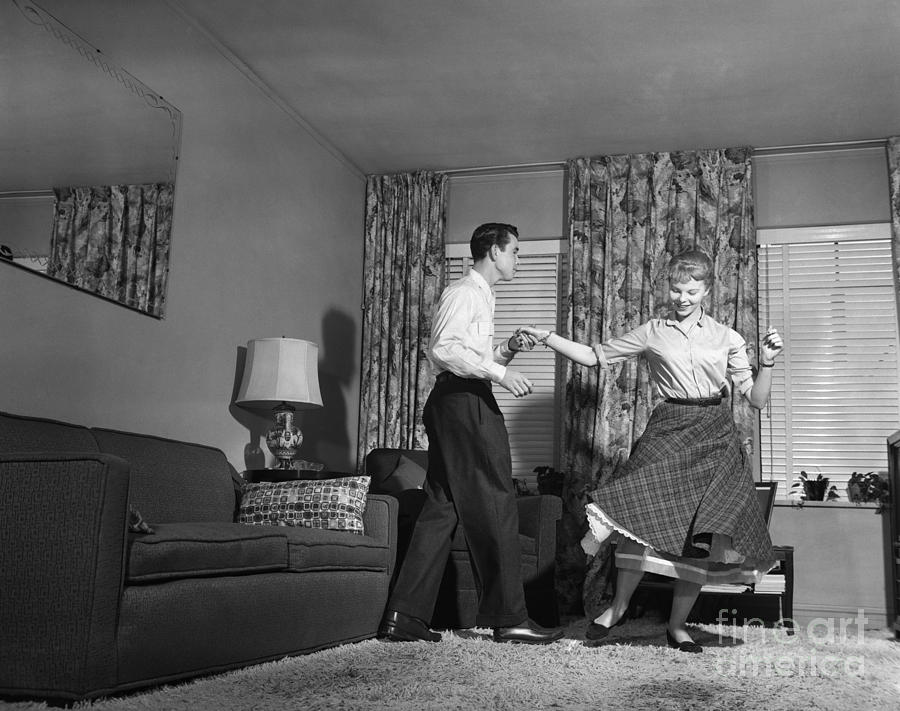 Teen Couple Dancing At Home, C.1950s Photograph by Debrocke/ClassicStock