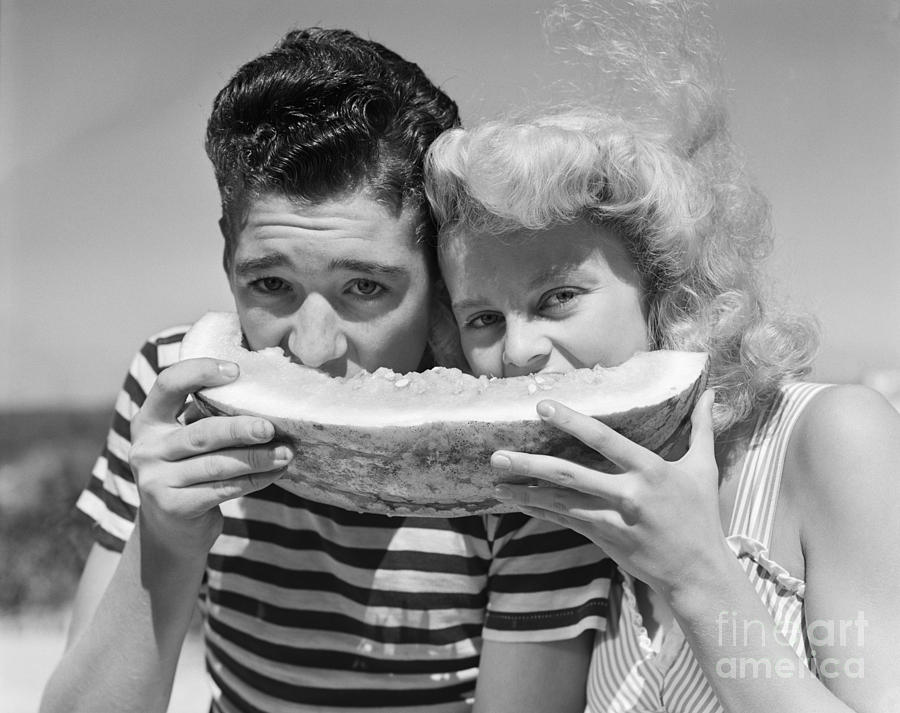 Teen Couple Sharing Watermelon, C.1950s Photograph by H. Armstrong Roberts/ClassicStock