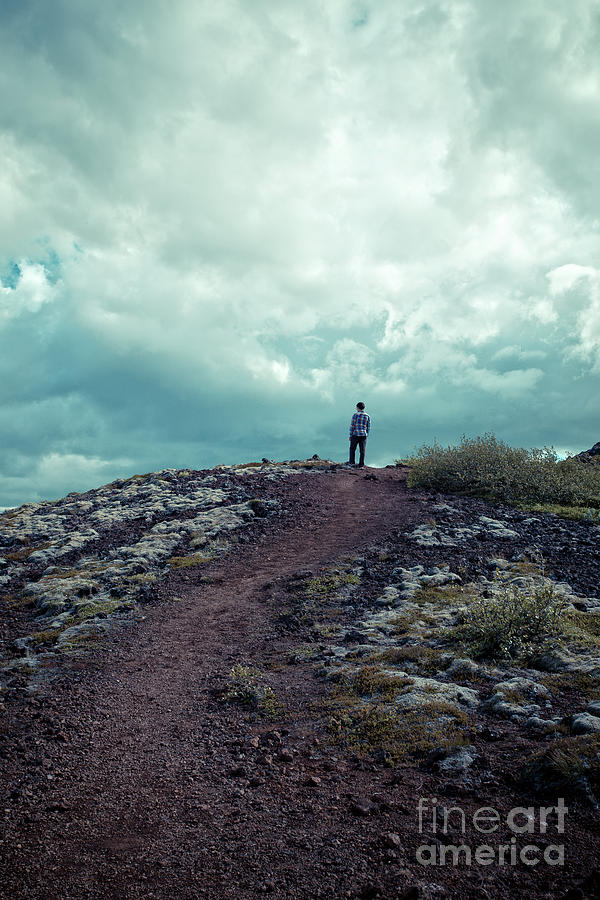 Teenager on a hiking trail in Iceland Photograph by Edward Fielding