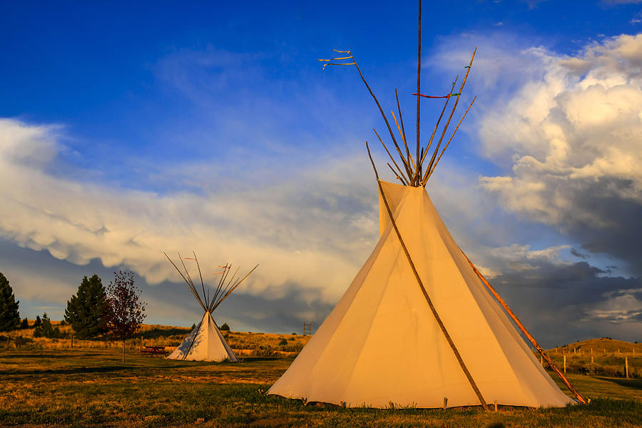 Tepees at sunset in Montana Photograph by Chris Smith