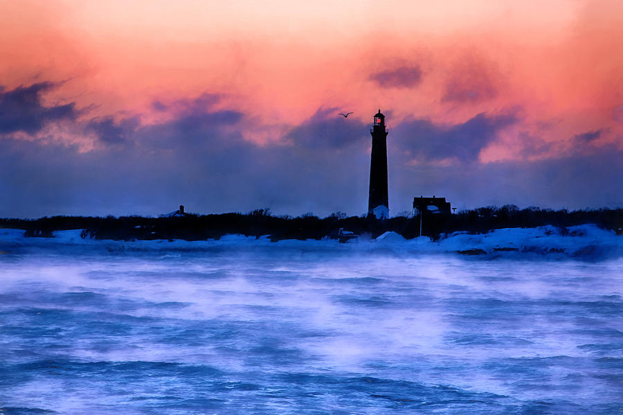 Thacher Island lighthouse sea smoke Photograph by Jeff Folger