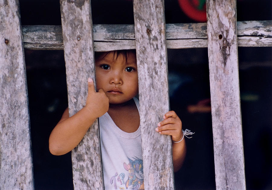Thai Girl at Front Door Photograph by John Gilroy