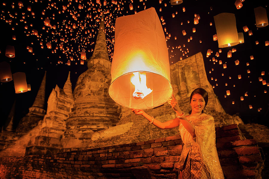 Thai lady enjoy yeepeng festival Photograph by Anek Suwannaphoom