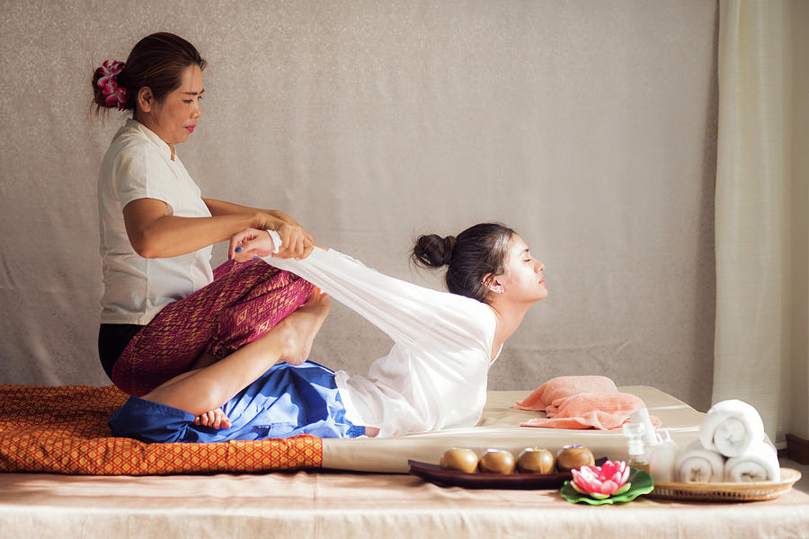 Thai original massage for woman in many spa Photograph by Anek Suwannaphoom
