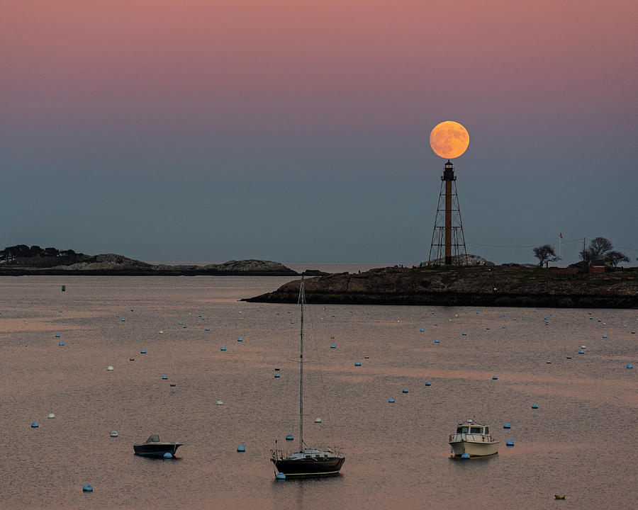 Sunset Photograph - The 2016 Supermoon balancing on the Marblehead Light Tower in Marblehead MA by Toby McGuire