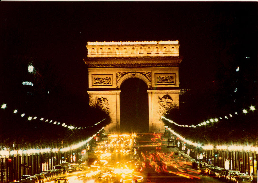 The Arc de Triomphe at Night Photograph by Thomas Bezigian